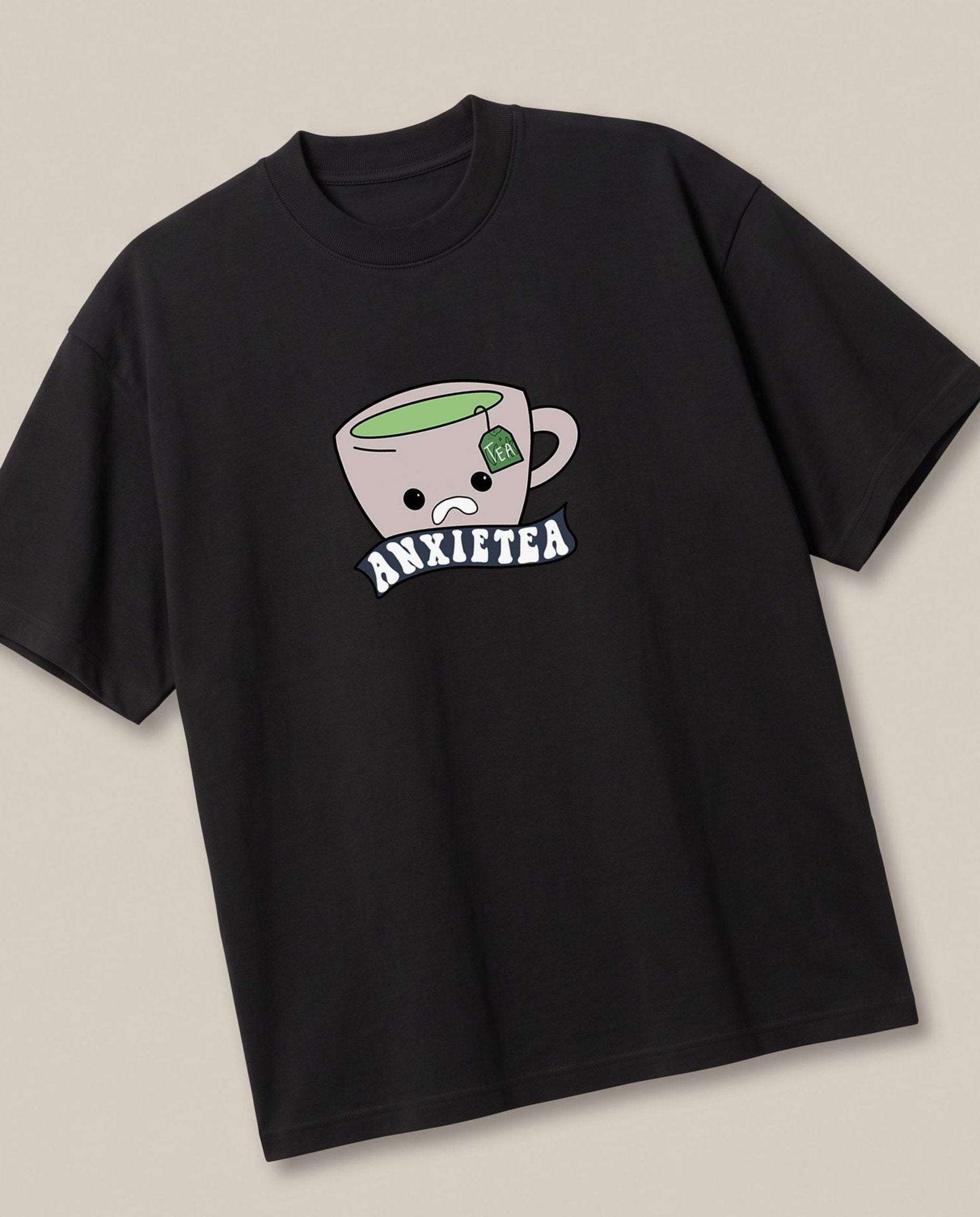 Anxietea Black oversized t-shirt — cup of tea anxirty, angled view