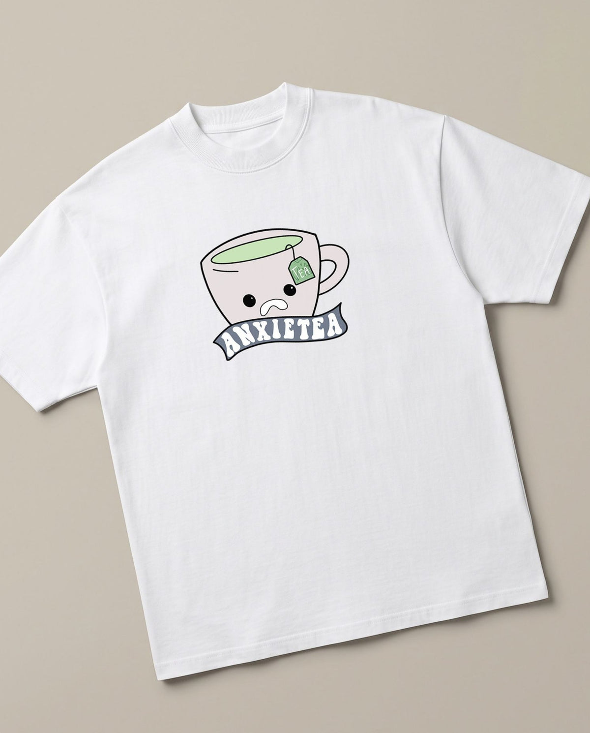 Anxietea White oversized t-shirt — cup of tea anxirty, angled view