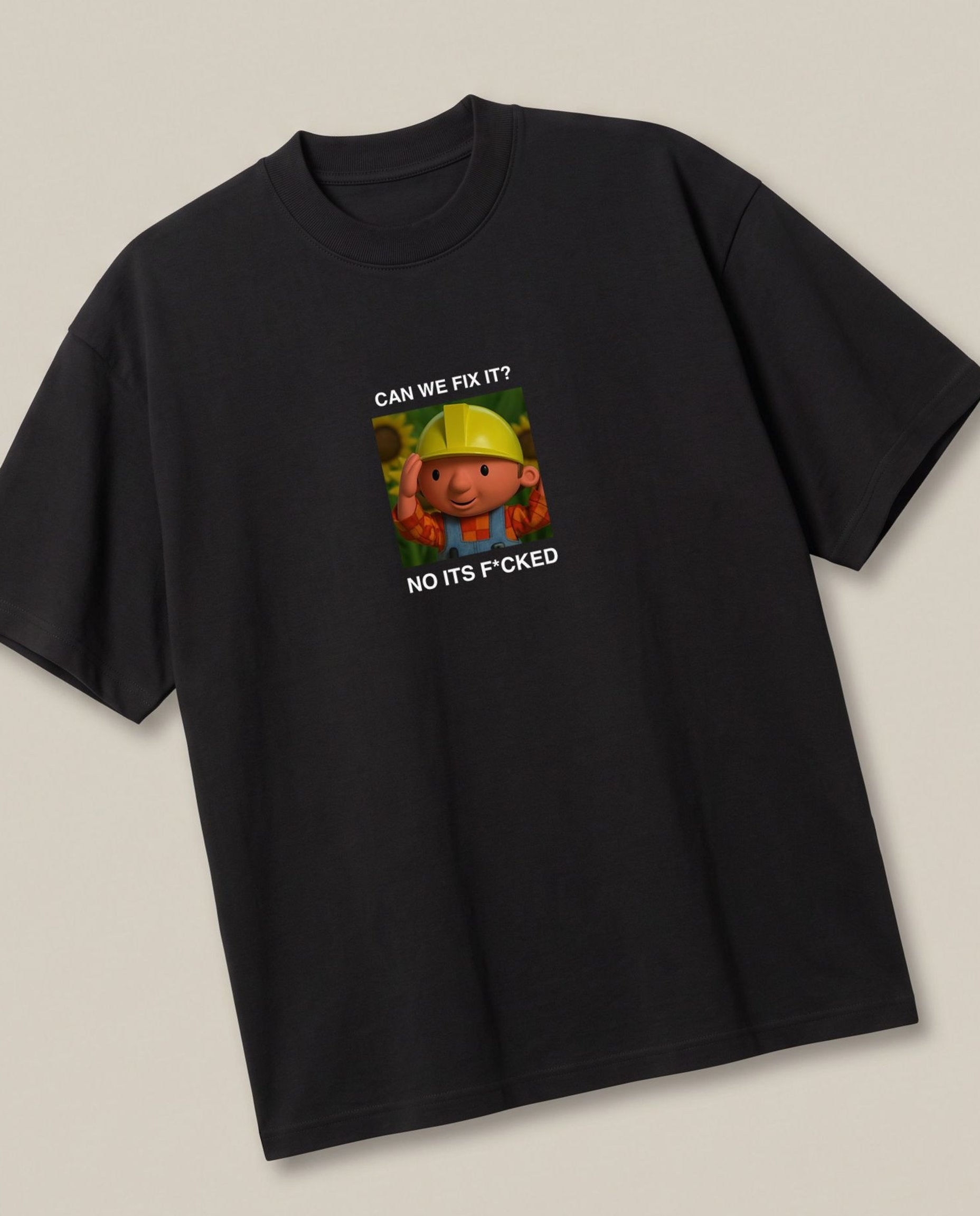 Bob The Builder Black oversized t-shirt — bob the builder thinks we cant do it, angled view