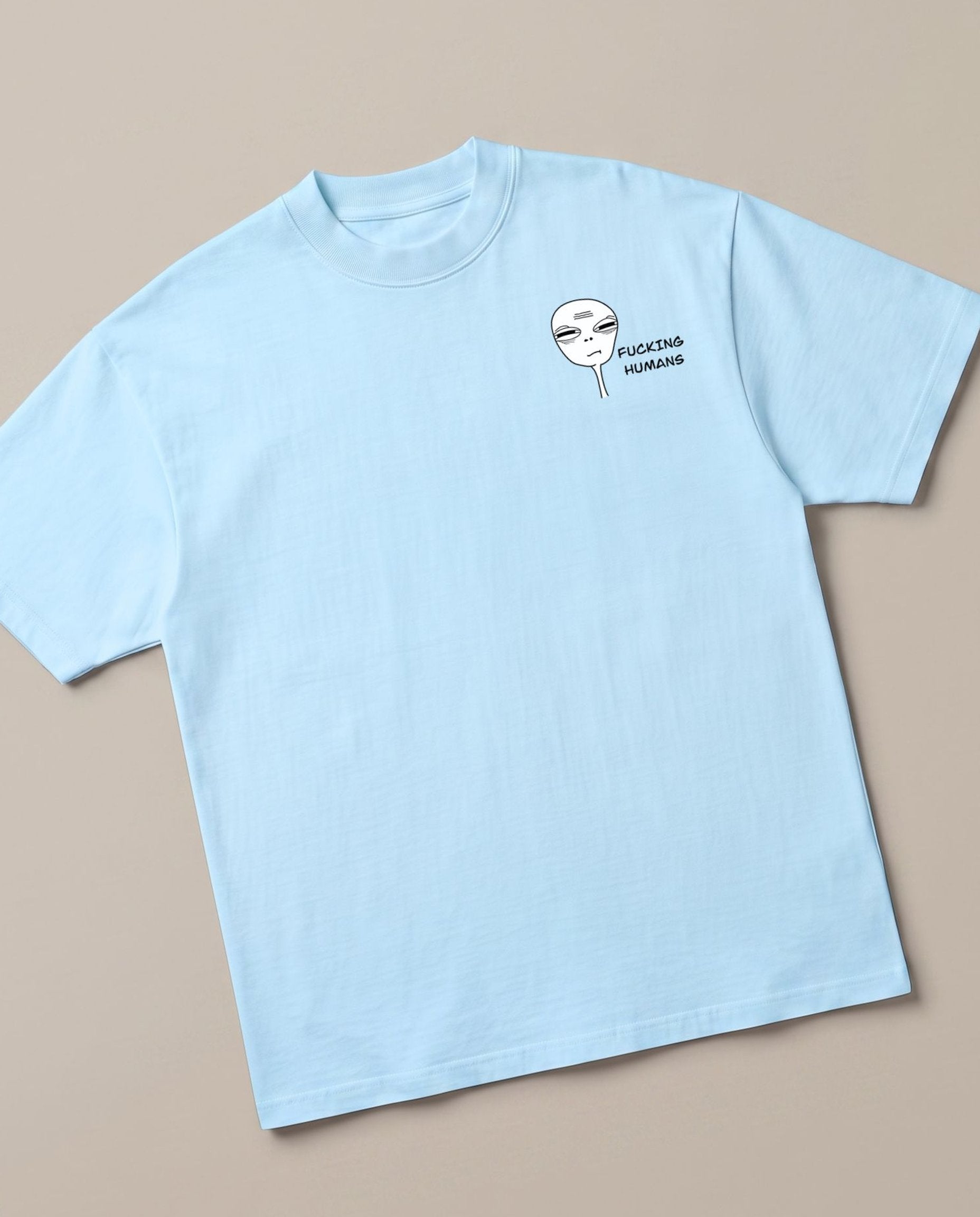 F**king Humans Baby Blue oversized t-shirt — alien hating human, angled view