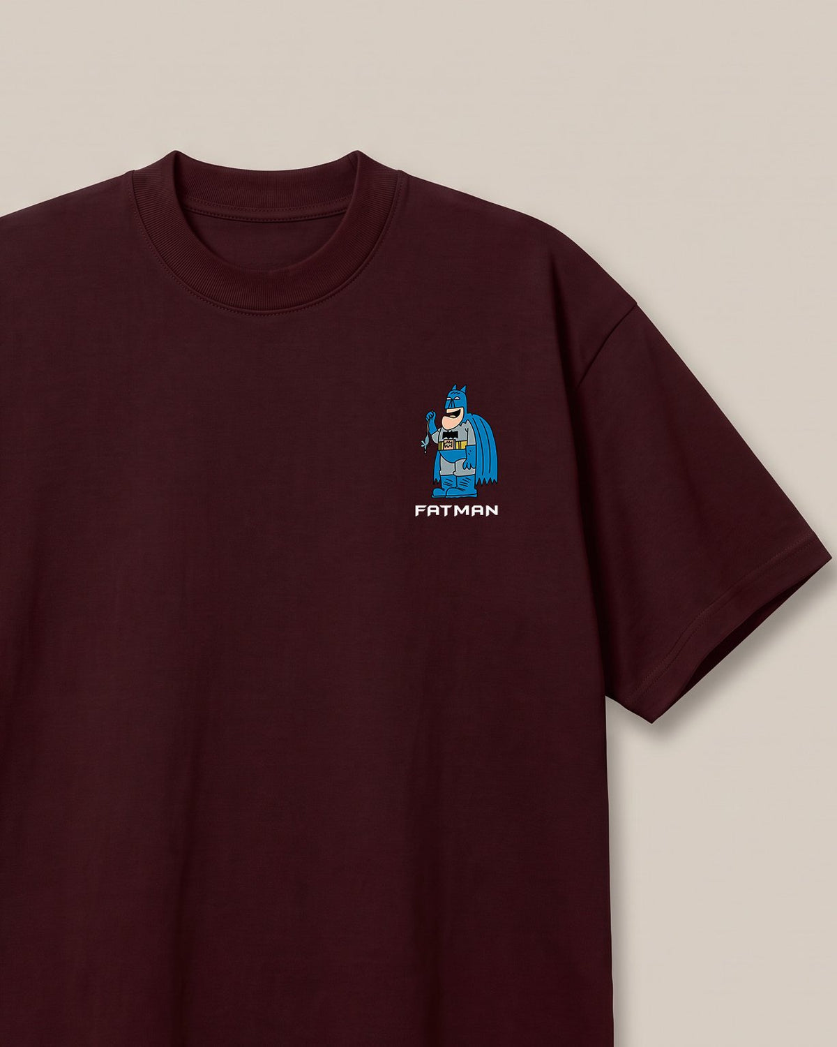 Fatman Maroon oversized t-shirt — fat batman giving competition to penguin, front print