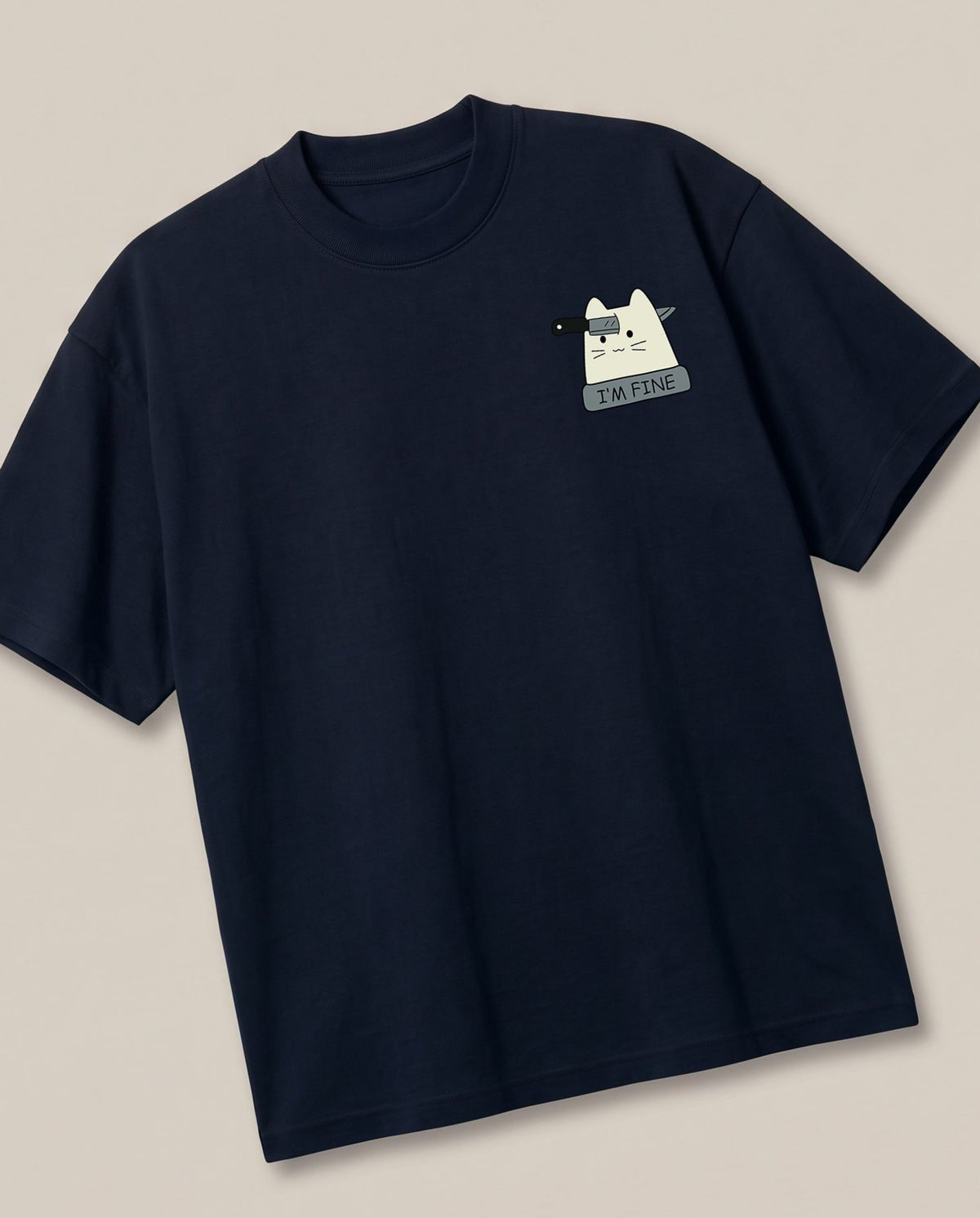 Fine Navy oversized t-shirt — cat with a knife sarcastic fine, angled view