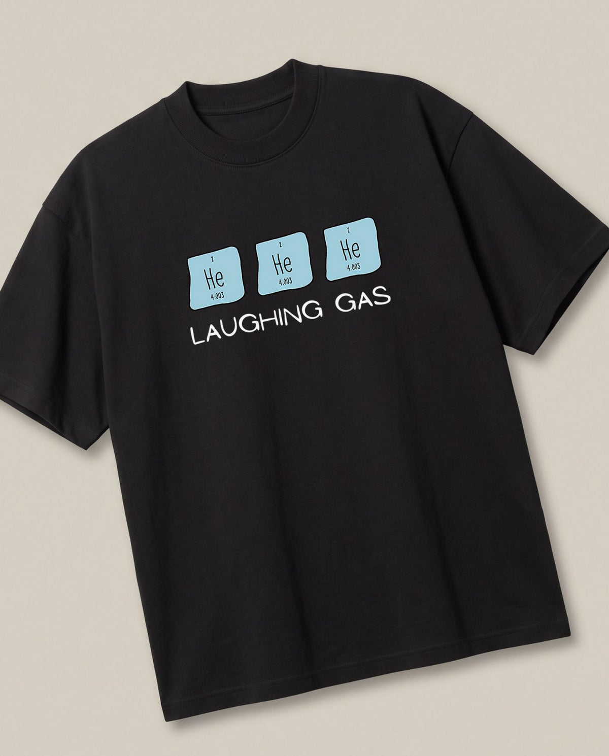 Hehehe Black oversized t-shirt — chemistry joke laughing gas, angled view