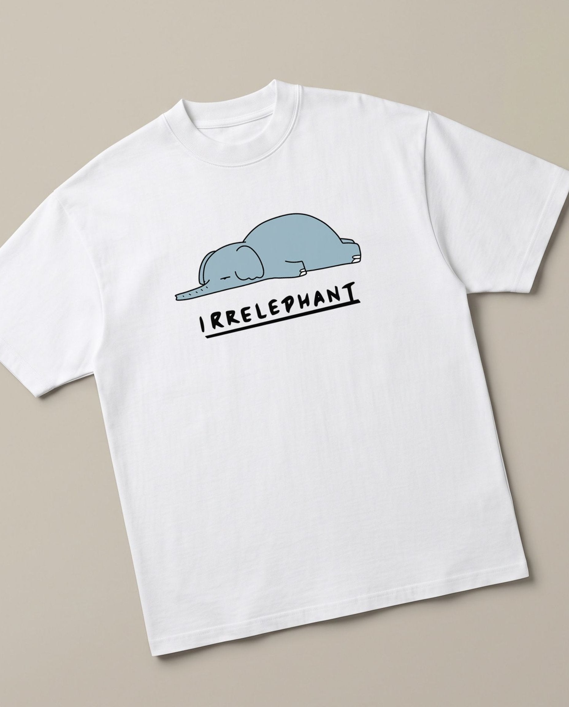 Irrelephant White oversized t-shirt — the elephant is irrelevent oun, angled view