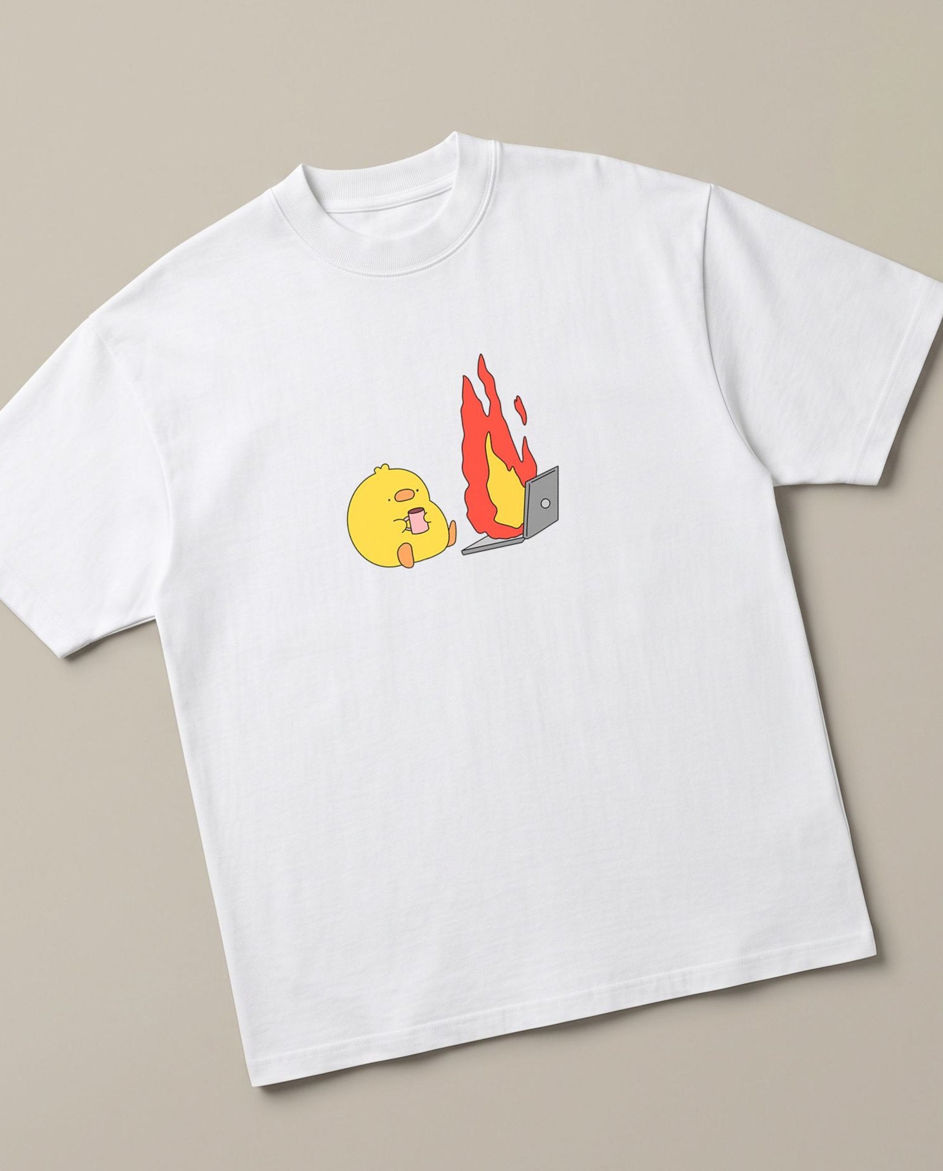 Just A Normal Monday White oversized t-shirt — "office meme , duck in front of a burning computer on a monday", angled view