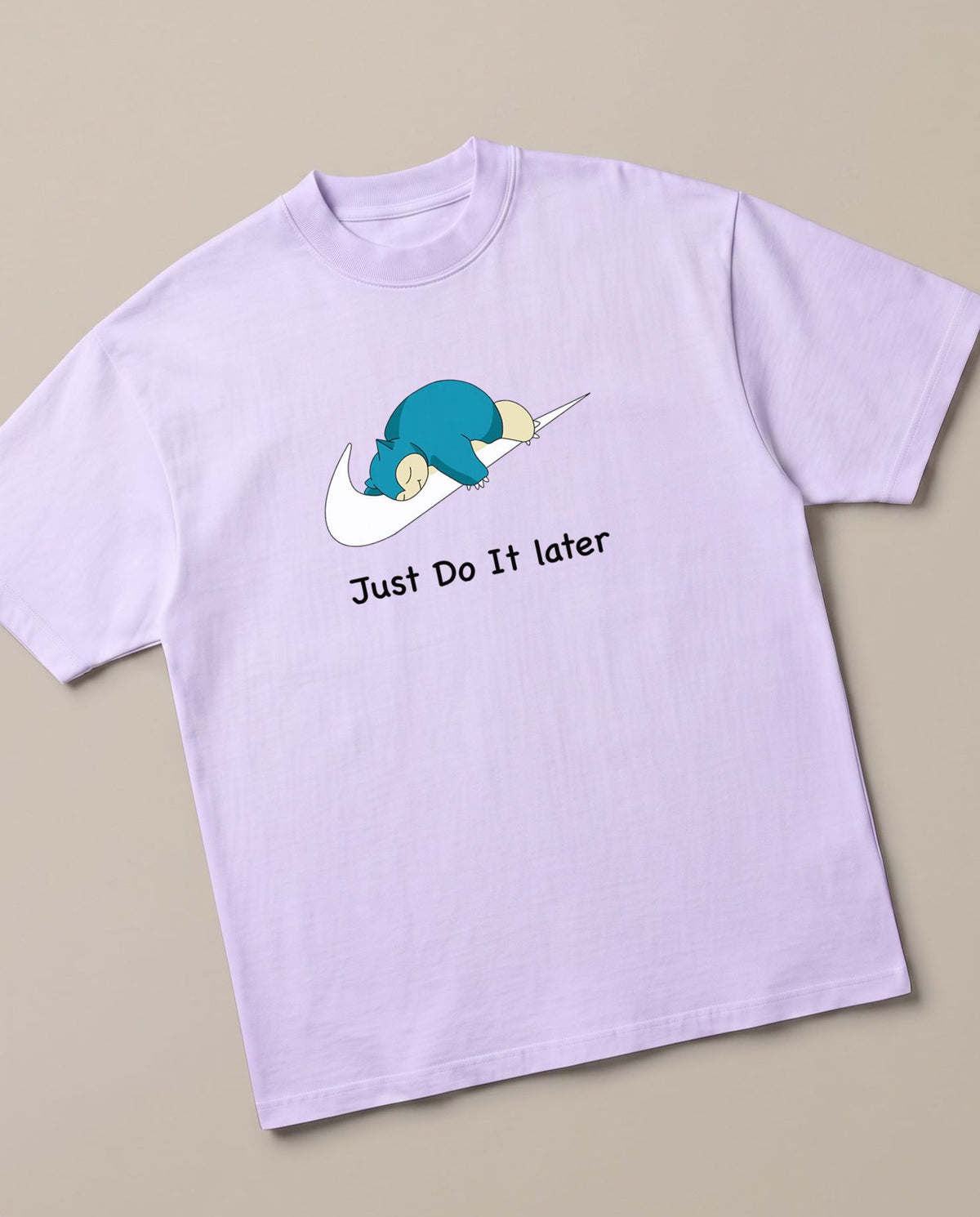 Just Do it Later Lavender oversized t-shirt — lazy snorlax on a nike swosh, angled view