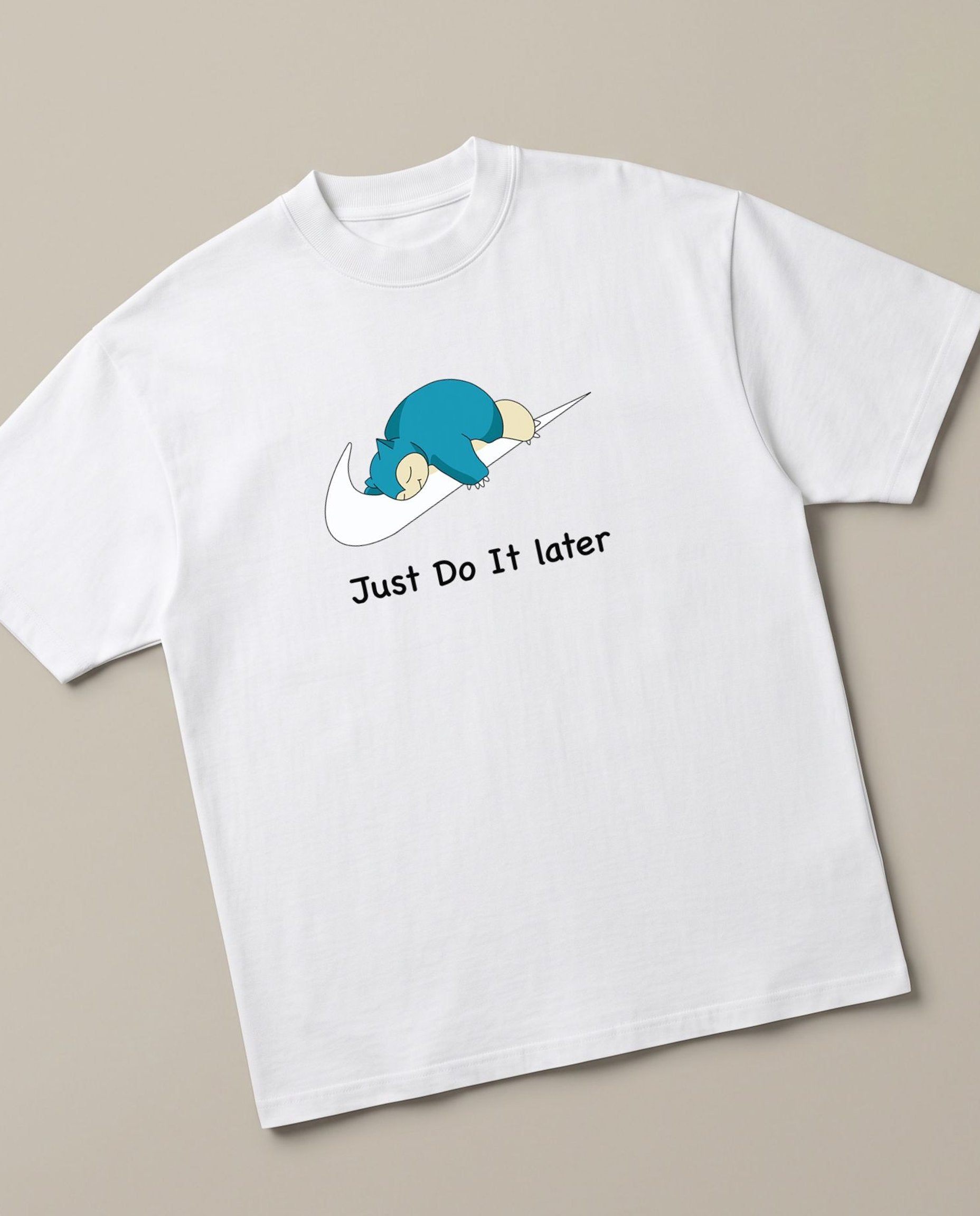 Just Do it Later White oversized t-shirt — lazy snorlax on a nike swosh, angled view