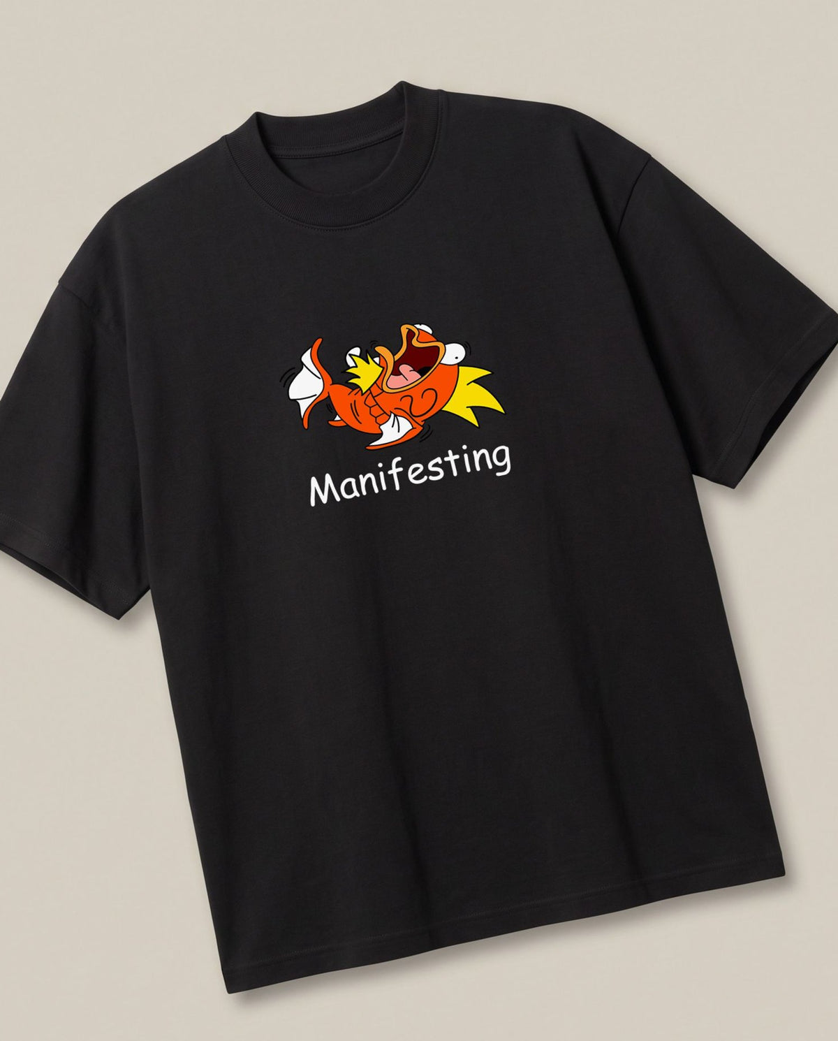 Manifesting Black oversized t-shirt — magikarp manifesting to become a Gyarados, angled view