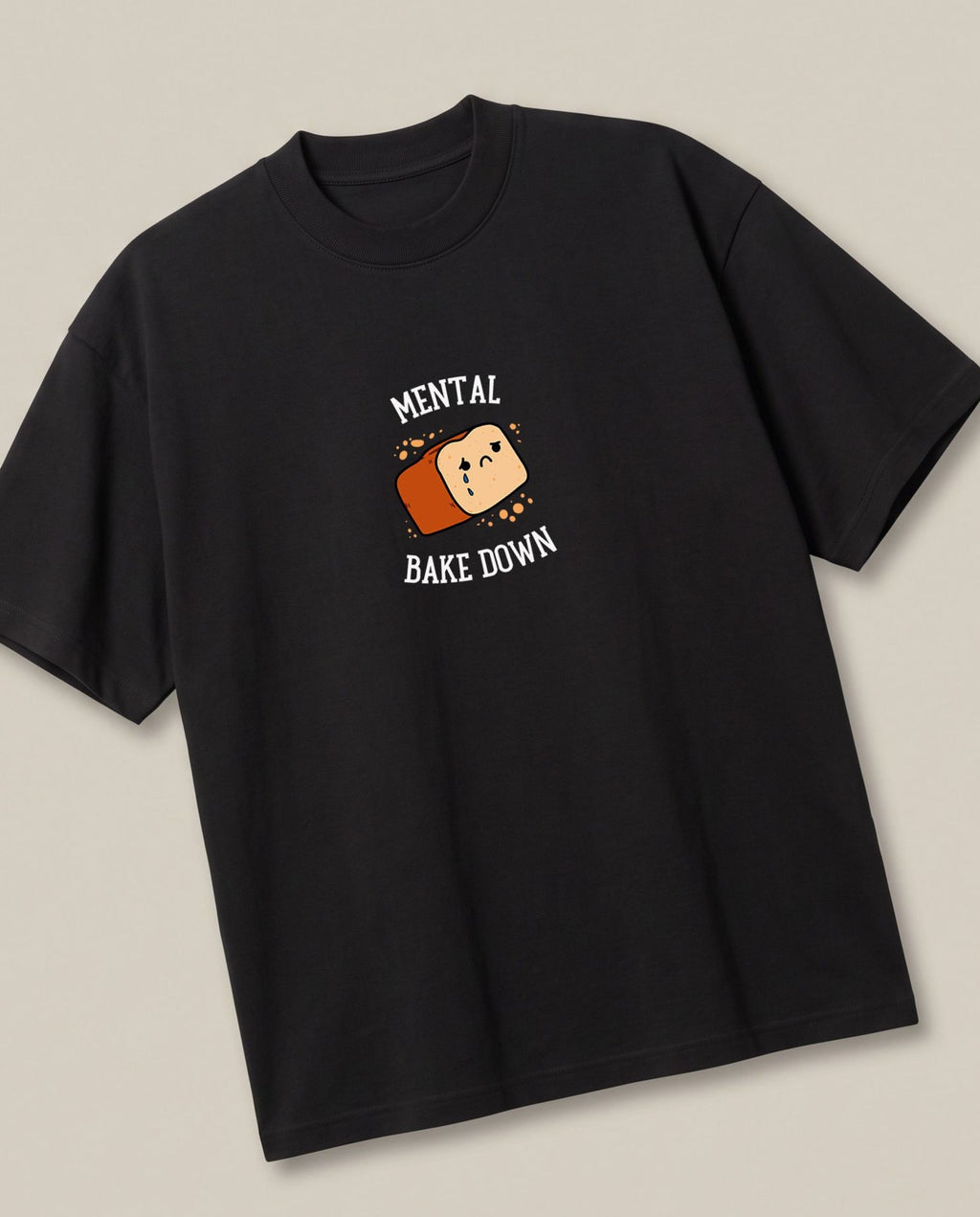 Mental Bakedown Black oversized t-shirt — a loaf of bread having a breakdown, angled view
