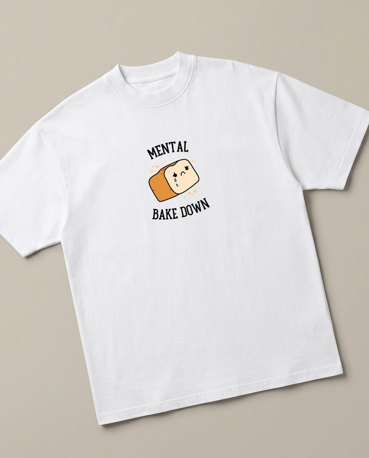 Mental Bakedown White oversized t-shirt — a loaf of bread having a breakdown, angled view