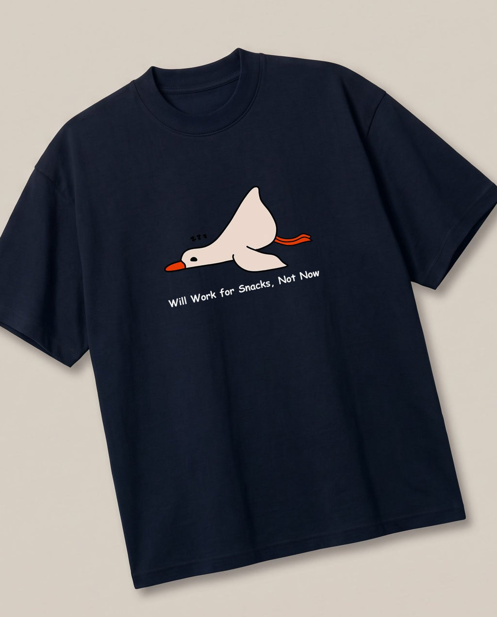 Nap Now, Work Never Navy oversized t-shirt — lazy duck, angled view