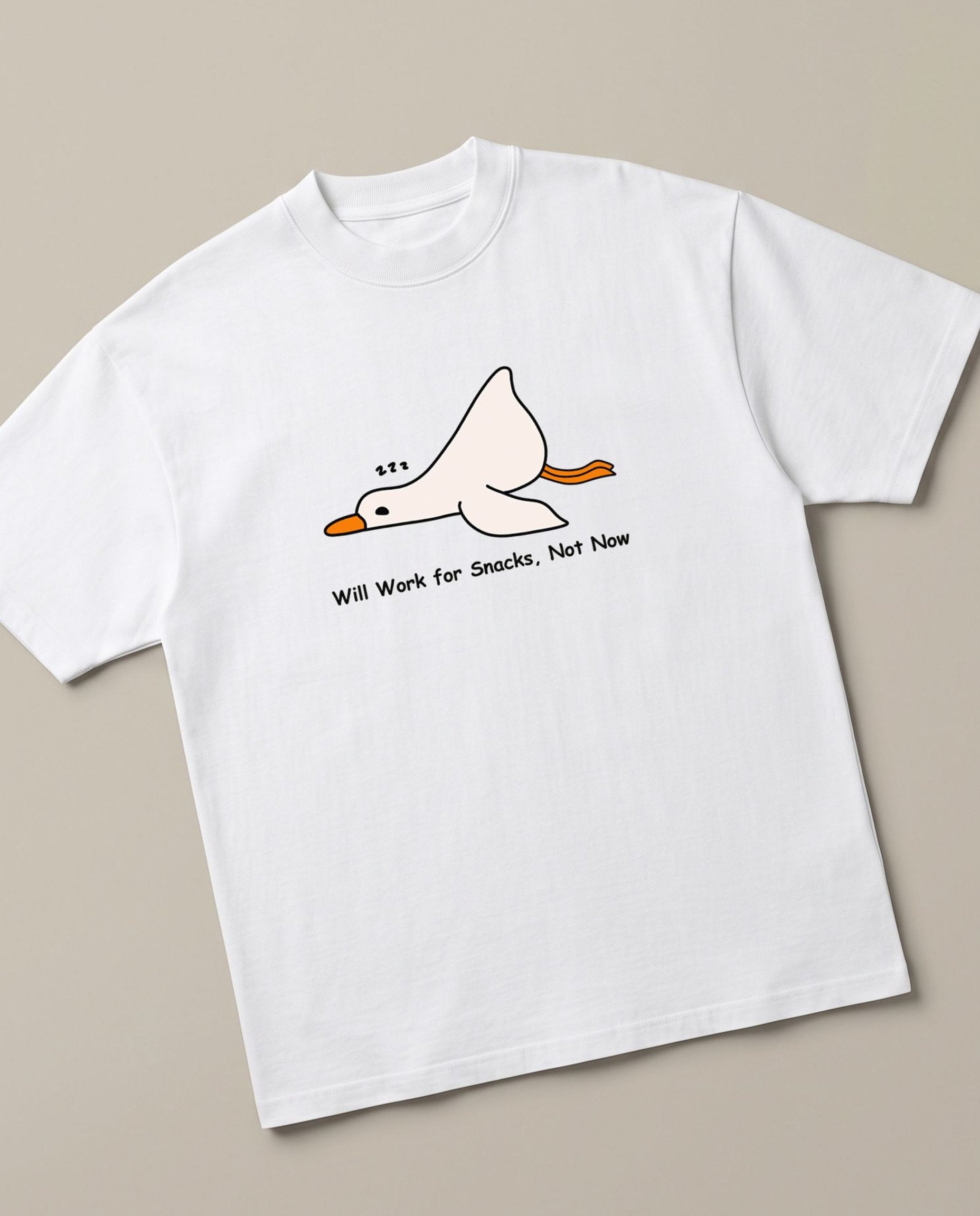 Nap Now, Work Never White oversized t-shirt — lazy duck, angled view