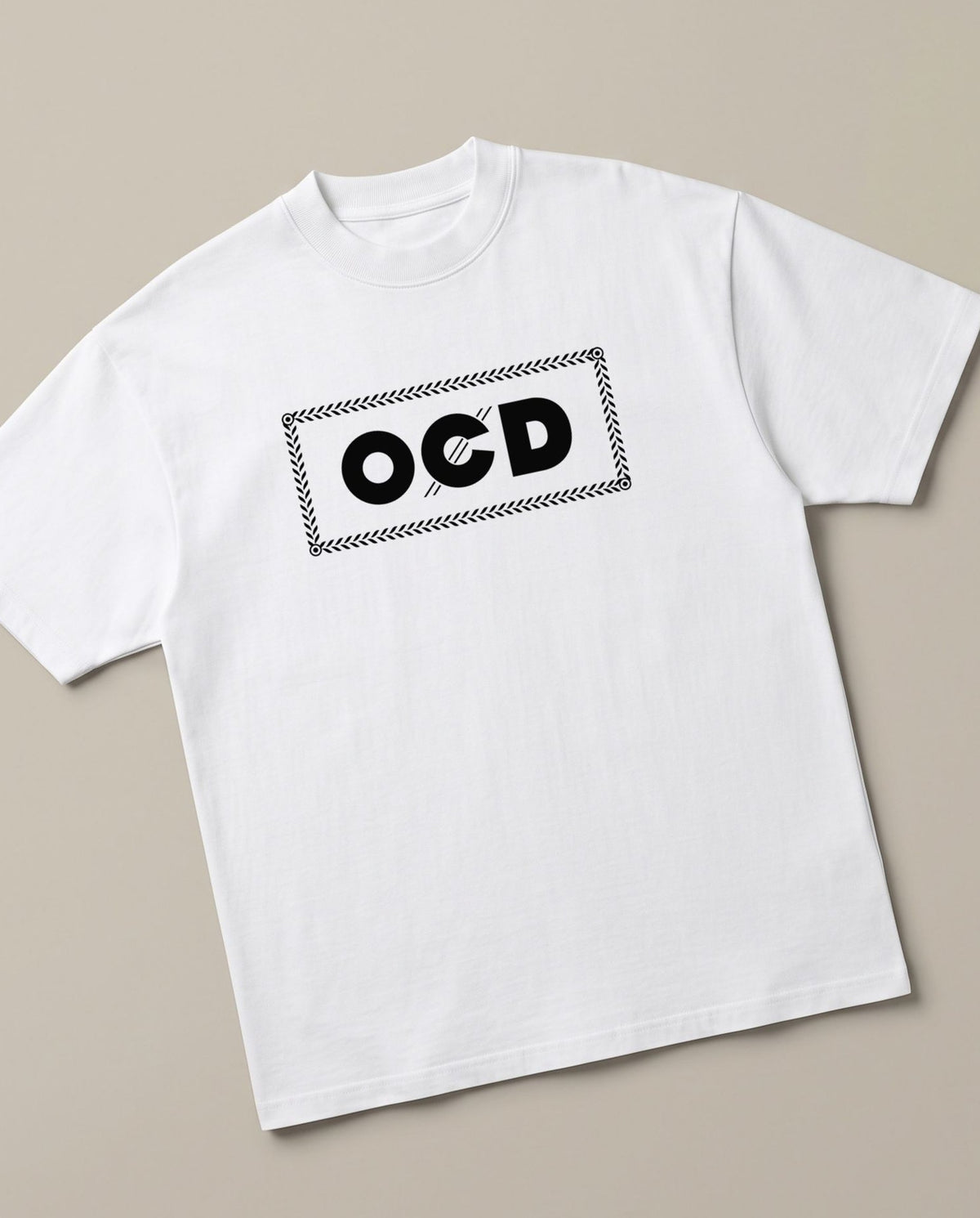 OCD White oversized t-shirt — rolling paper ocd pun, angled view