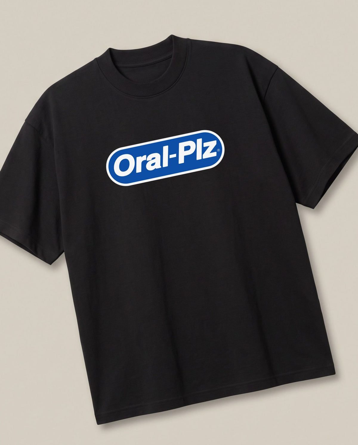 Oral Plz Black oversized t-shirt — oral b parody funny, angled view