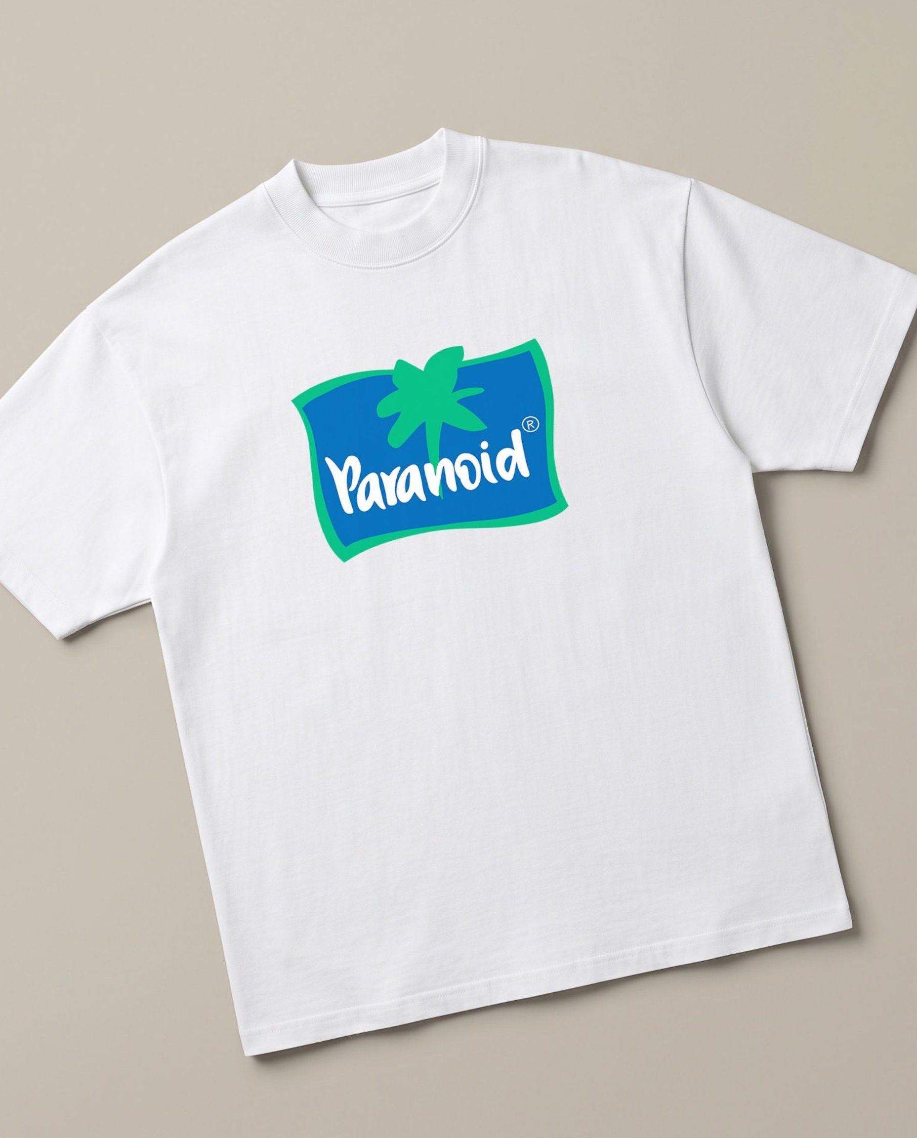 Paranoid White oversized t-shirt — parchute logo parody, angled view