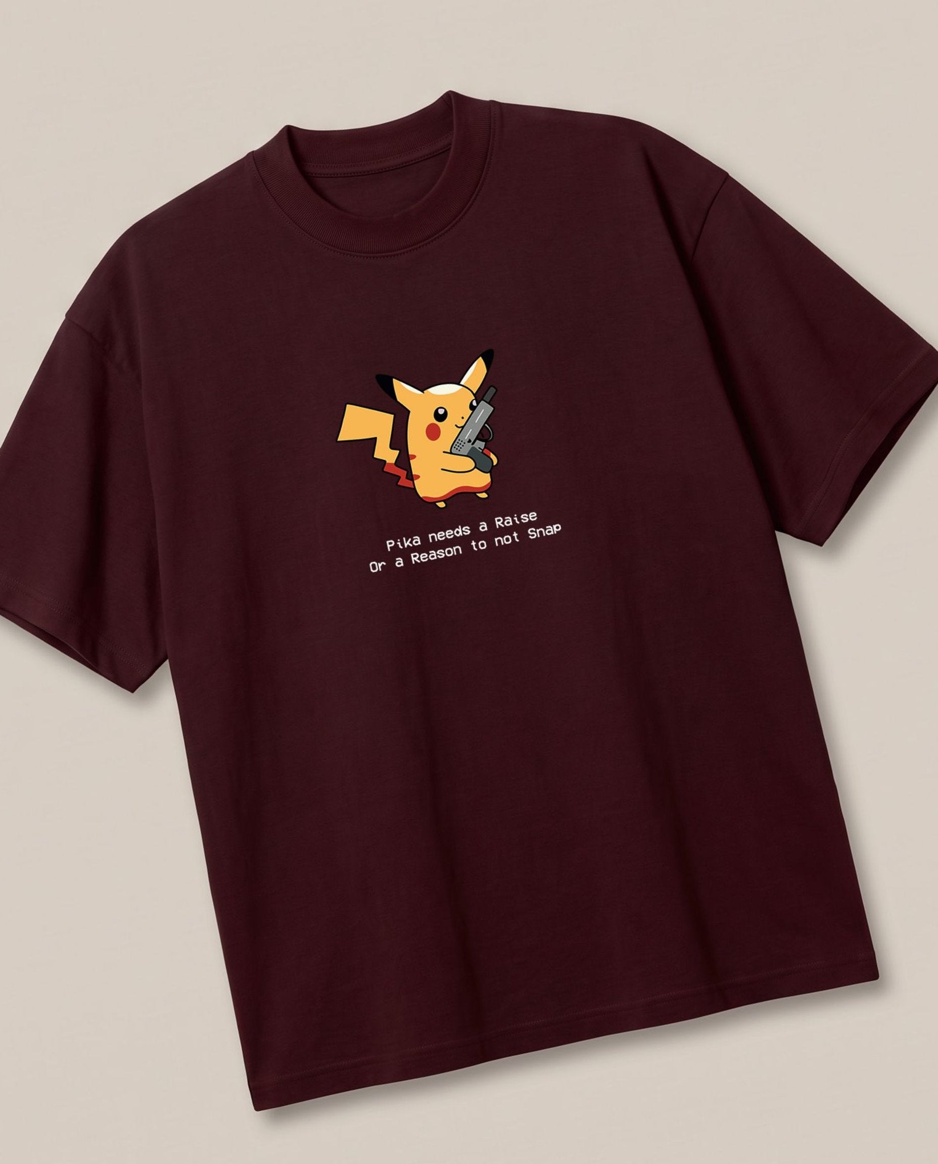 Pikachu Needs a Raise Maroon oversized t-shirt — pikachu pokemon needs a raise, angled view