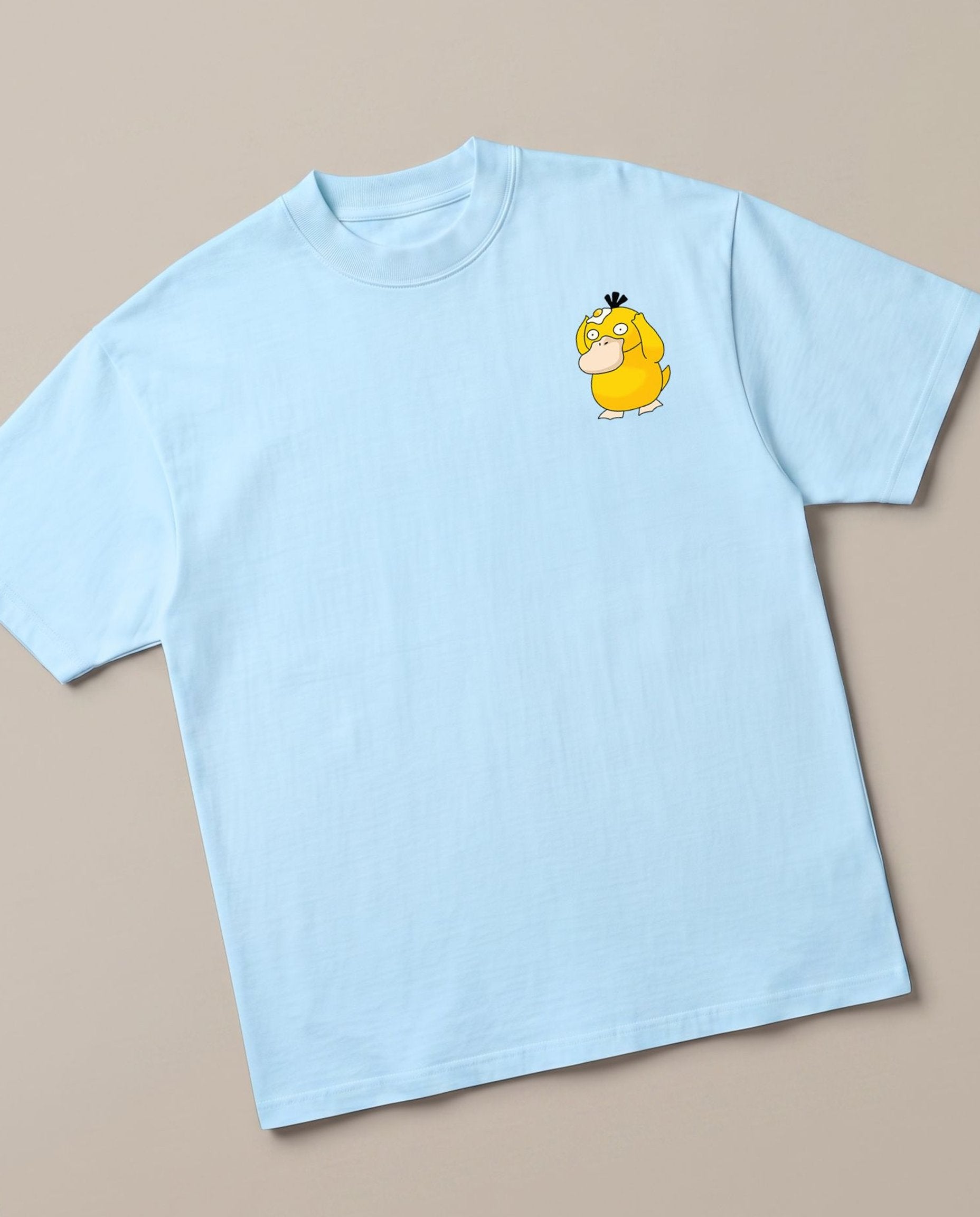 Psyduck Baby Blue oversized t-shirt — psyduck pokemon frying egg on his head out of confusion, angled view