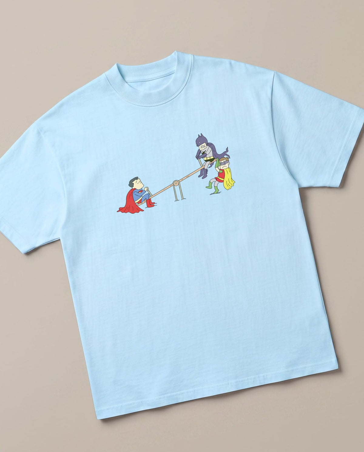 Real Dawn of Justice Baby Blue oversized t-shirt — superman batman civil war, angled view