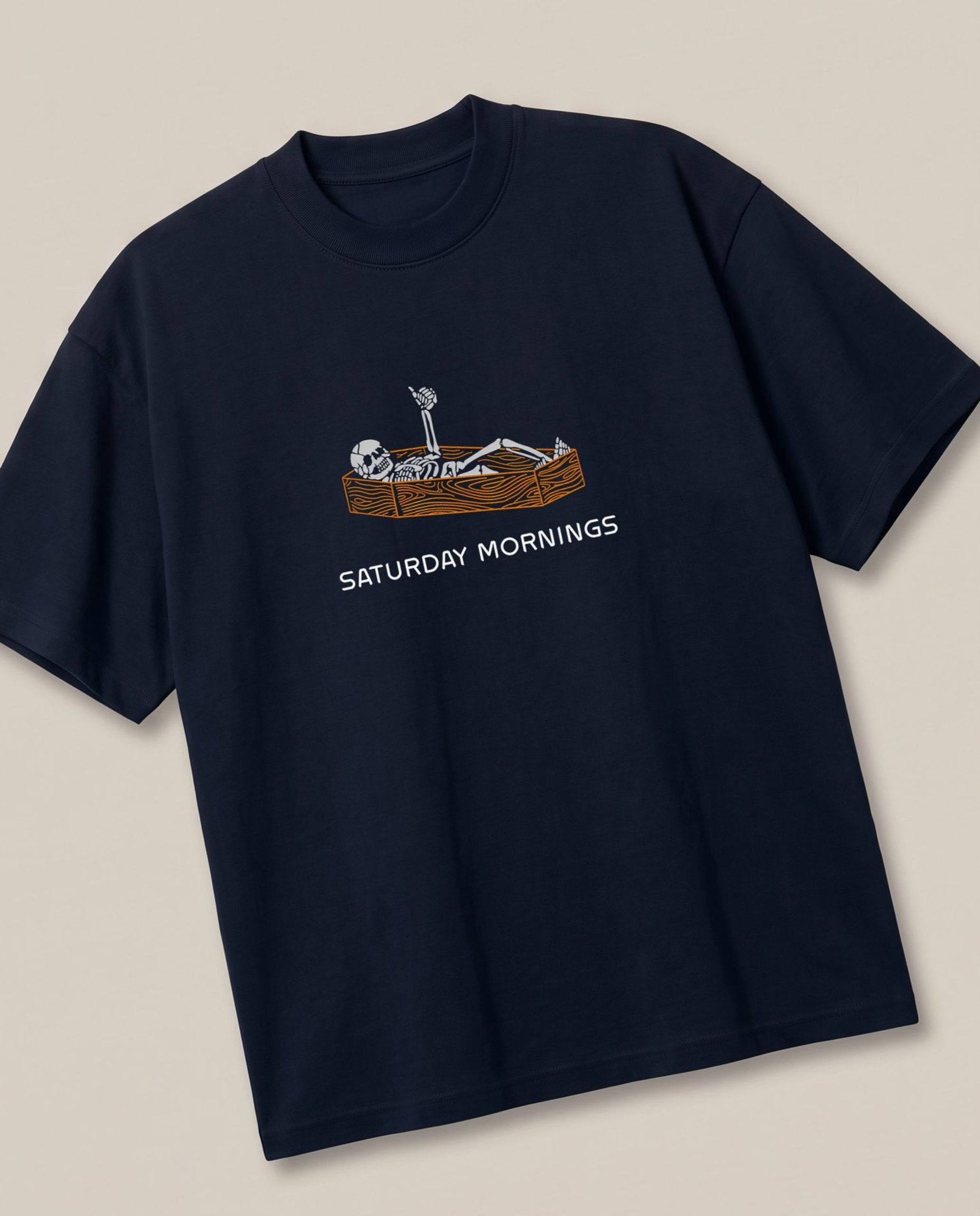 Saturday Mornings! Navy oversized t-shirt — like getting hangover from office work, angled view