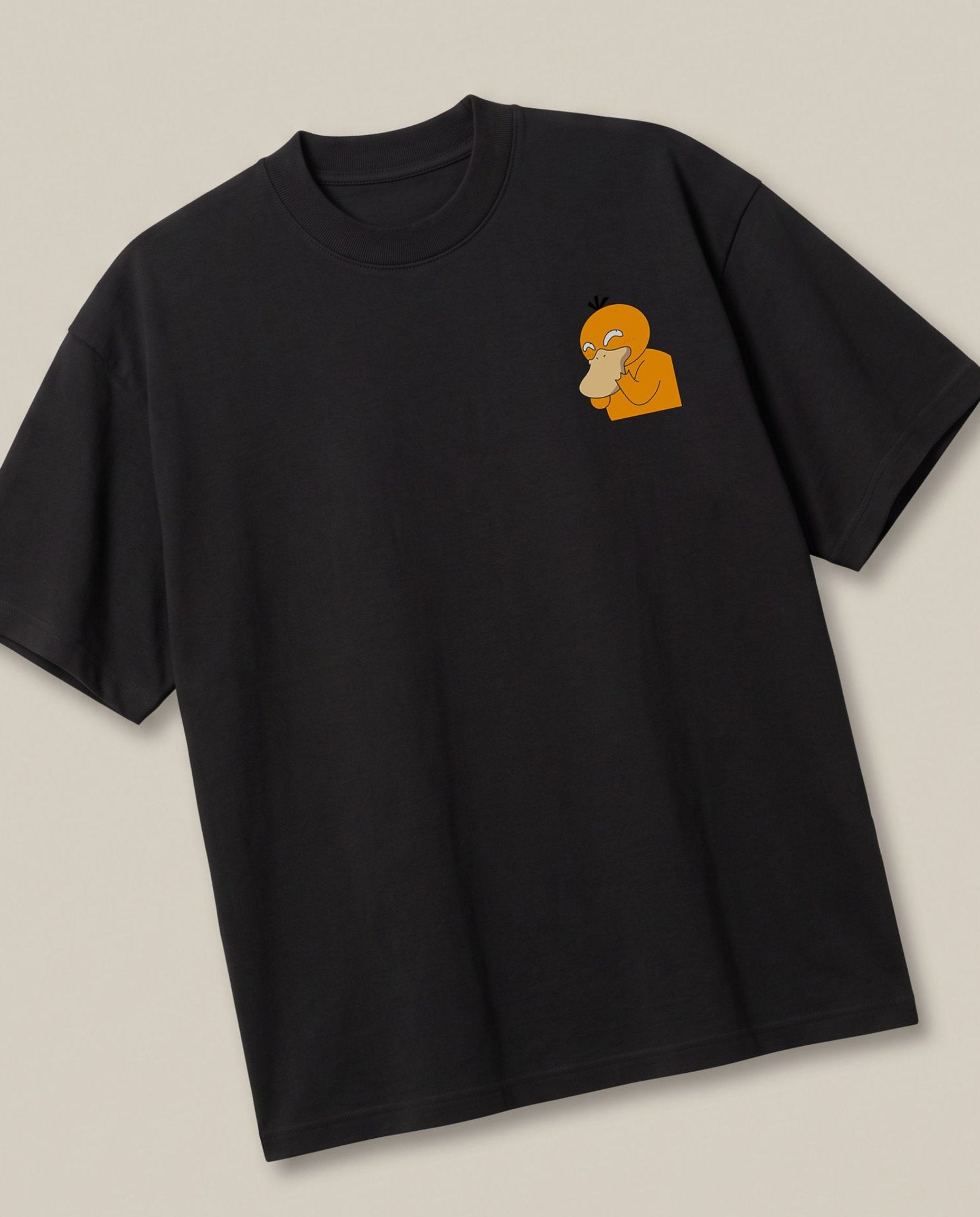 Shyduck Black oversized t-shirt — psyduck pokemon is very shy, angled view