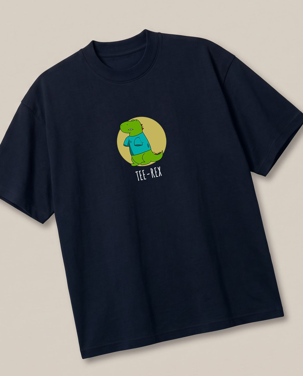 TEE-REX Navy oversized t-shirt — trex wearing a tshirt, angled view