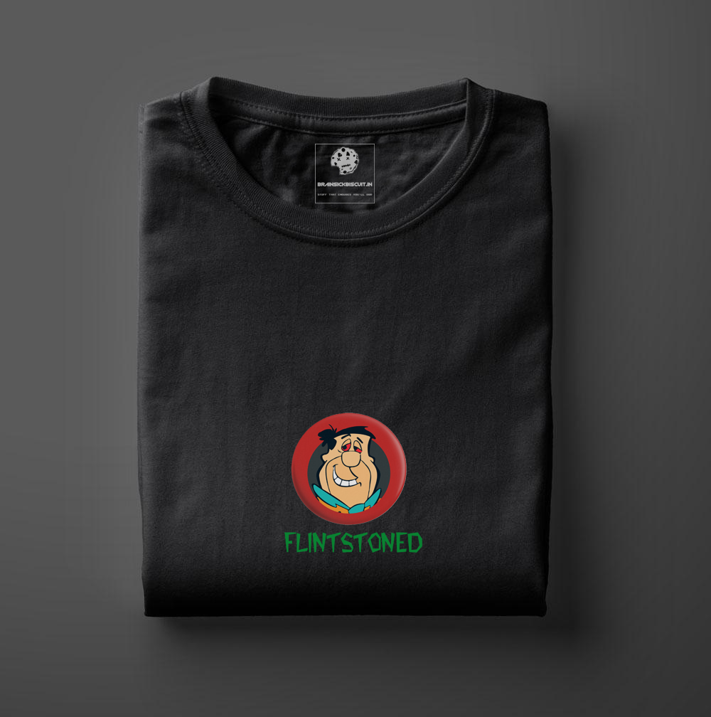 flintstone character badge on folded black t-shirt