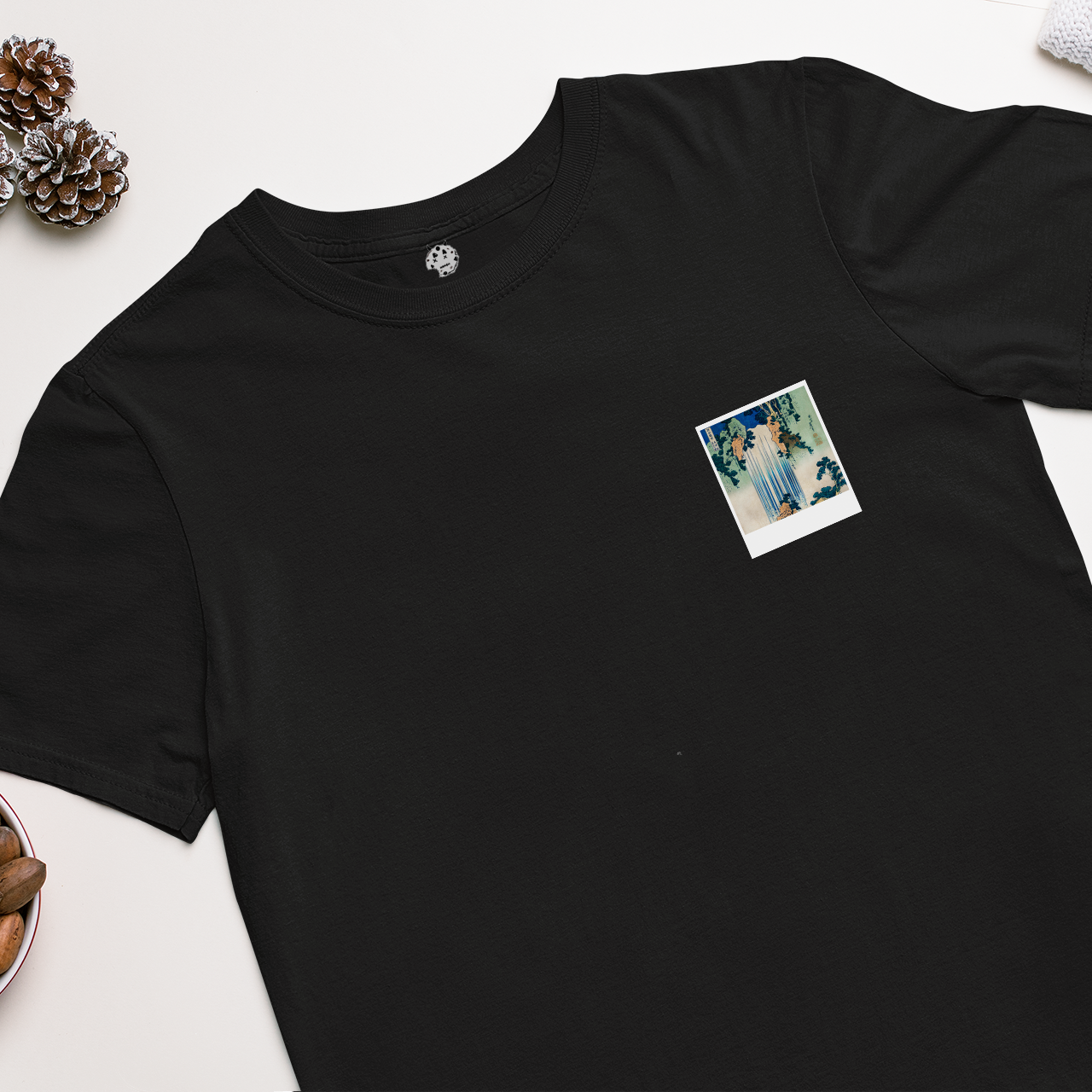 Japanese waterfall and foliage polaroid on black t-shirt.